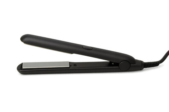 Modern hair straightener with power cord, isolated on transparent background, ready for hair styling