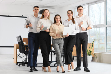 Fototapeta premium Business people with laptops in conference hall