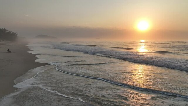 Florianopolis in Santa Catarina during a wonderful sunrise. Mo&ccedil;ambique Beach in aerial view.
