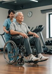 Asian Senior Man in Wheelchair With Nurse in Gym Healthcare Setting