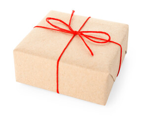Gift wrapped in kraft paper with bow isolated on white