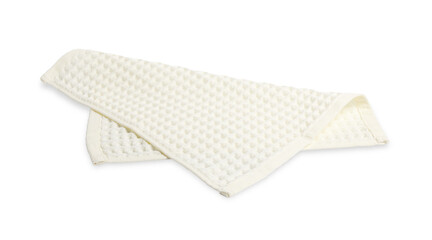 Clean beige waffle towel isolated on white