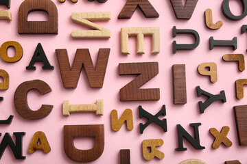 English letters on pink background