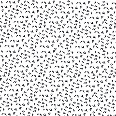 The texture consists of small dashes, dots, and short lines.