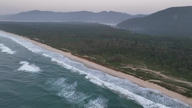 Florianopolis in Santa Catarina during a wonderful sunrise. Mo&ccedil;ambique Beach in aerial view.