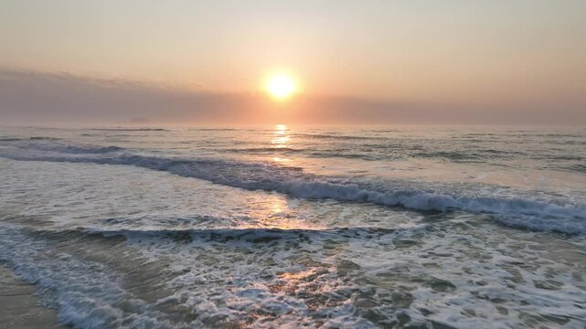 Florianopolis in Santa Catarina during a wonderful sunrise. Mo&ccedil;ambique Beach in aerial view.