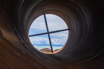 metal casing pipes of large diameter, stacked.  They are used in bridge construction, in...