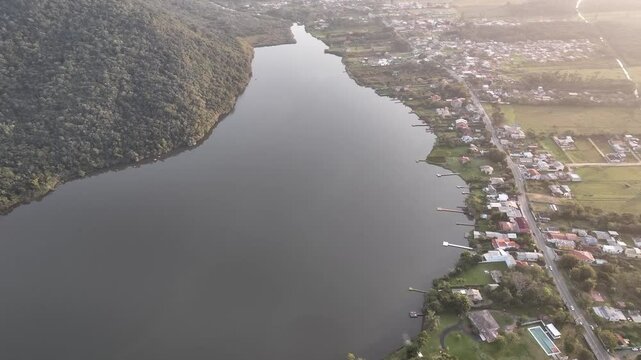 Florianopolis in Santa Catarina during a wonderful sunrise. Mo&ccedil;ambique Beach in aerial view.