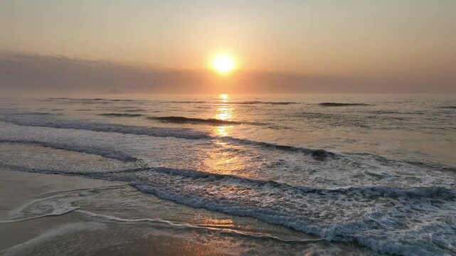 Florianopolis in Santa Catarina during a wonderful sunrise. Mo&ccedil;ambique Beach in aerial view.