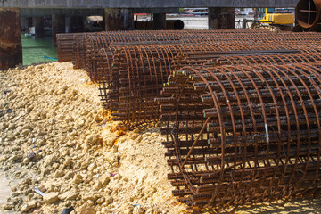 Reinforcement frame for drilling piles. Shape: Cylindrical, with transverse and longitudinal rods....