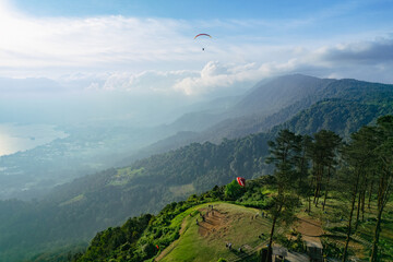 Aerial view of the paragliding attraction at Puncak Lawang, Agam Regency, West Sumatra © afdal