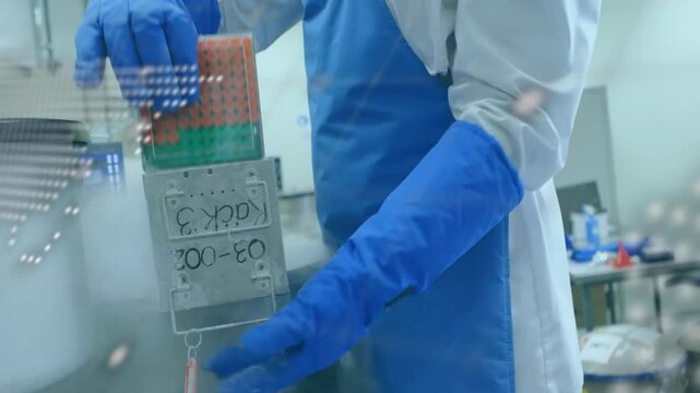 Gripping cryogenic dewar gloved technician retrieving vials via code overlay for sample transfer