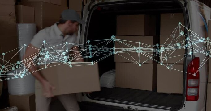 Delivery worker arriving van unloading and wrapping boxes for shipment smiling holding smartphone