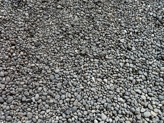 background of gravel layer, small stones spread out in gray, small gravel stones isolated in natural color, suitable for product catalog design