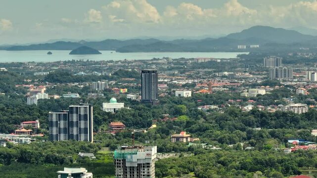 Aerial view of panorama of Kota Kinabalu city with modern buildings. Borneo,Sabah, Malaysia.