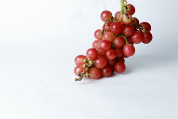 Bunch of Fresh Red Grapes on White