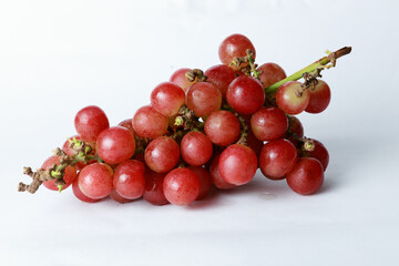Bunch of Fresh Red Grapes on White