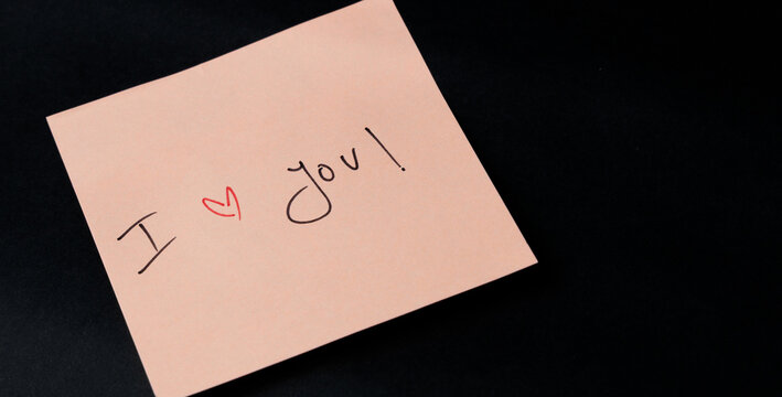 Expressing Love handwrite in a pink Note