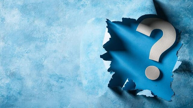Question mark symbol emerging through ripped paper on textured blue background