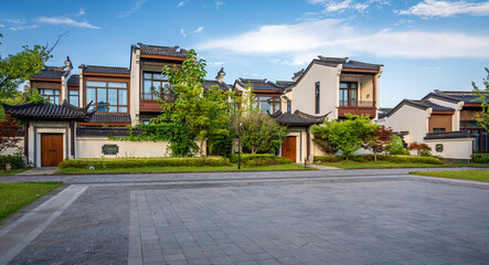 Elegant Traditional Architecture Harmoniously Blends with Nature in a Peaceful Neighborhood