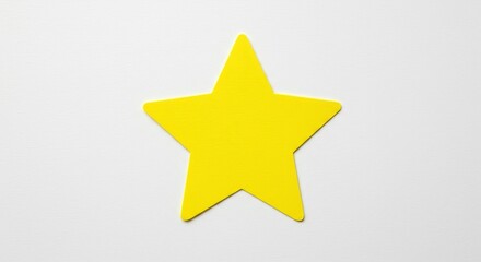 Obraz premium Isolated Yellow Star Shape Cutout on White Background Studio Shot
