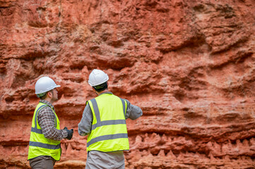 Expert geologists are analyzing layers of rocks that have been deposited for a long time to learn...