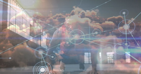 Image of network of connections and sky with clouds over african american man doing push-ups