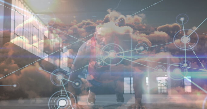 Image of network of connections and sky with clouds over african american man doing push-ups