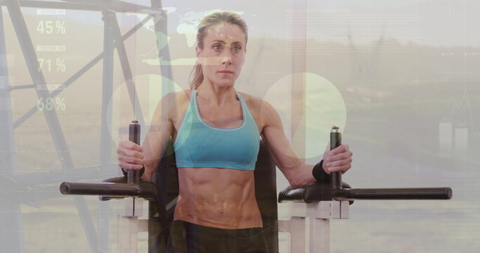 Image of graphs over caucasian woman exercising at gym