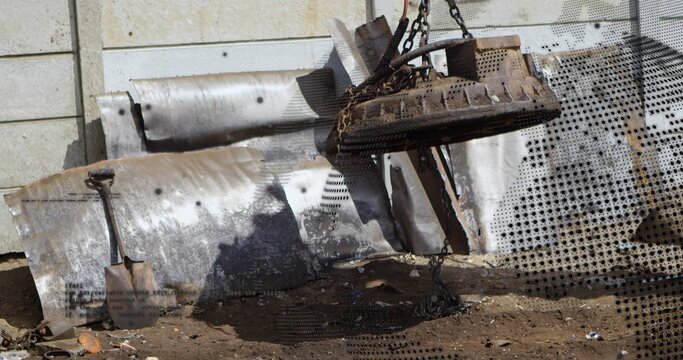 Fototapeta Image of globe rotating over car junkyard