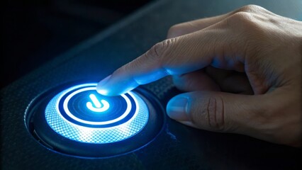 Finger pressing a glowing button, symbolizing activation or technology interaction.