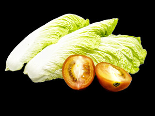 Chinese cabbage is a leafy vegetable with broad leaves that are light green to pale white, with...