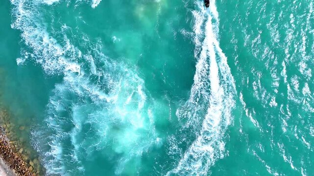 Water activities in a jet ski in Red Sea - Drone Aerial view 4k video