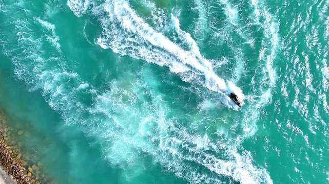 Water activities in a jet ski in Red Sea - Drone Aerial view 4k video