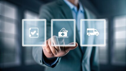 A businessman touches a virtual screen with icons for checklist, medical services, and ambulance, symbolizing digital healthcare solutions.