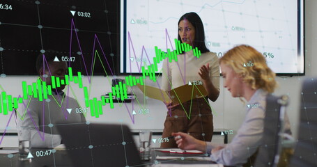 Image of data processing over diverse business people at meeting