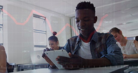 Image of data processing over diverse students using tablets and laptops