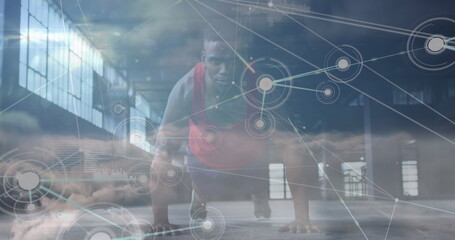 Image of data processing over african american man doing push ups