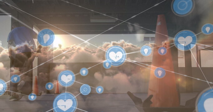 Image of data processing over african american man playing football