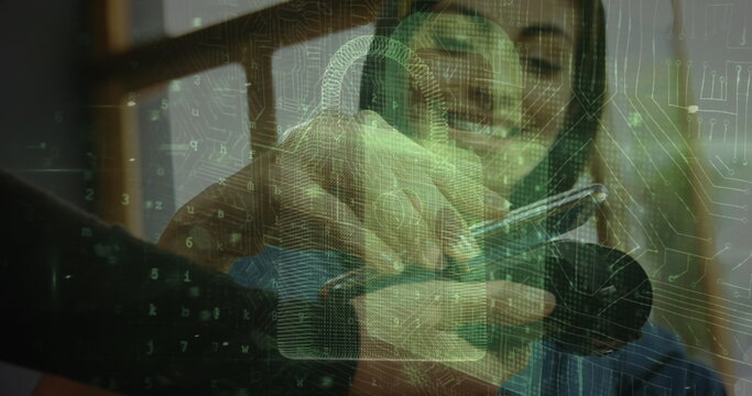 Image of digital padlock over hands of caucasian woman using payment terminal and smartphone