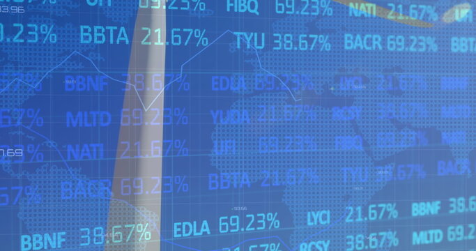 Stock market data processing over rear view of male engineer taking picture of the windmill