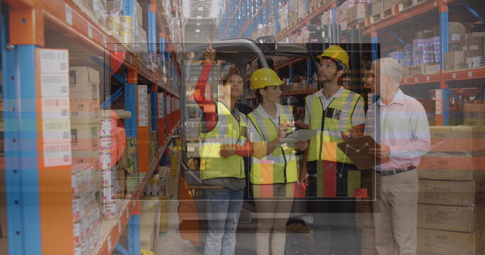 Image of financial data over diverse female and male warehouse workers