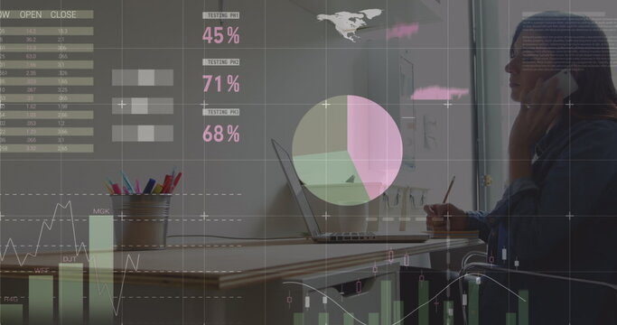 Image of statistics and data processing over man using computer