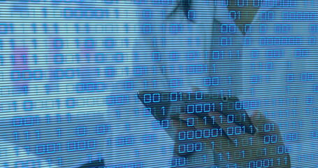 Image of binary coding over mid section of female scientist using digital tablet at laboratory