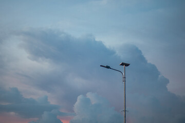 Streetlight Against Cloudy Sky