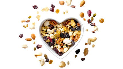 Heart-shaped bowl filled with assorted nuts and dried fruits, isolated on white background.