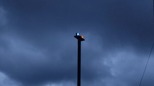 red blue roraty lights in cloudy sky