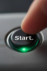 Finger pressing a start button with the text "Start" and green light, Pushing power button. Technology, Energy and Innovation

