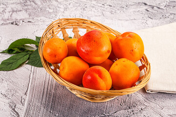 Raw ripe sweet apricots heap