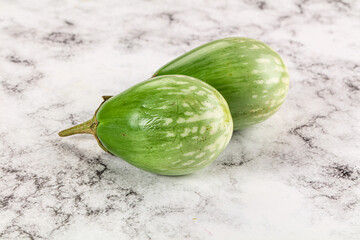 Ripe green mini eggplants heap